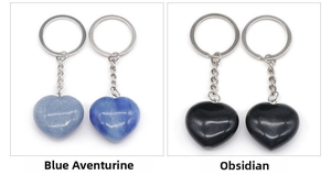 Detail view of heart-shaped blue aventurine and black obsidian gemstone keychains