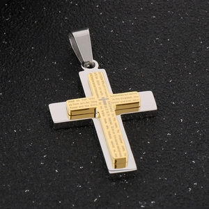 Detail of double-layer gold and silver cross pendant with Lord's Prayer engraving