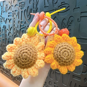 Handmade crochet sunflower keychain set for graduation gifts with colorful bells