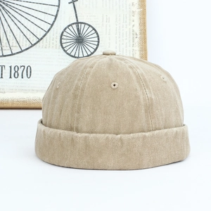 Vue détaillée du bonnet docker rétro kaki avec œillets et tissu en coton texturé épais