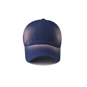 Detailed front view of navy blue washed cotton baseball cap with ventilation eyelets