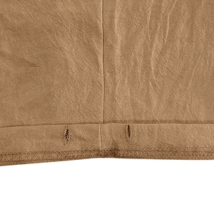 Detail view of linen blend fabric showing high-quality stitching and dual buttonhole accents