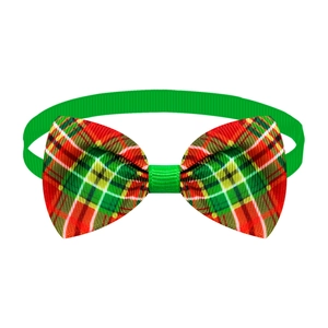 Detail of adjustable Christmas plaid bow tie for pets in festive red and green patterns