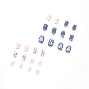Cute cartoon press-on nails set featuring blue bunny patterns and elegant plaid designs