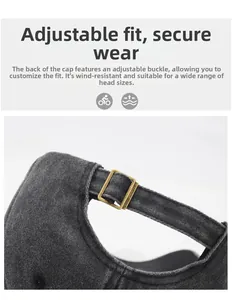 Detail of adjustable metal buckle on dark grey washed denim baseball cap for custom fit