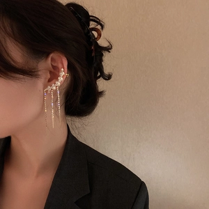 Elegant zircon leaf ear cuff with sparkling rhinestone tassels for a luxury aesthetic