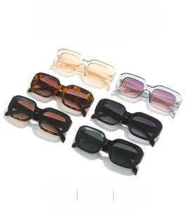 Multiple vintage square frame sunglasses in various colors displayed on a white background