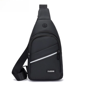 Detail of black sports crossbody bag featuring a headphone port and multi-zipper pockets