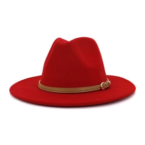 Close-up of red wool felt fedora with khaki leather band and gold metal buckle detail