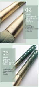 Detail of thickened gold metal ferrule and glitter lacquer handle on makeup brush