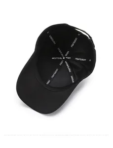 Detailed interior of the black baseball cap showing reinforced branded tape and stitching