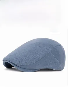 Close-up of sky blue corduroy beret hat showing detailed cotton vertical texture