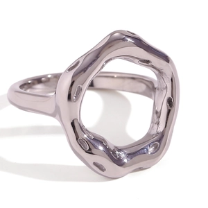 Irregular silver wavy ring in modern minimalist style on white background