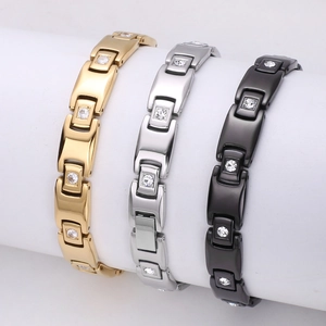 Pyramid link bracelets in gold, silver, and black stainless steel with crystal stones