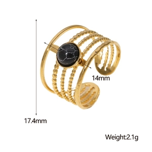 Detail view of wavy gold stainless steel ring with black marble stone and dimensions