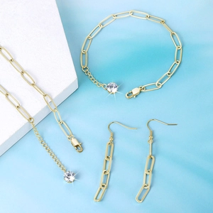 Parure bijoux dorée maille trombone avec pendentif cristal rond et boucles d'oreilles
