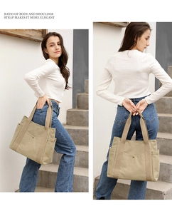 Outdoor lifestyle view of a beige canvas tote bag showing the body-to-strap ratio on a model