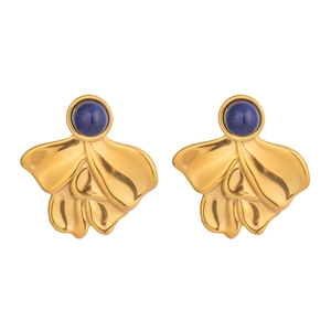 Detailed close-up of vintage geometric gold earrings with inlaid round lapis lazuli stones