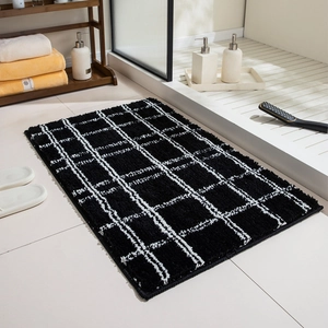 Modern black and white checkered bathroom rug with soft non-slip plush texture
