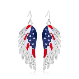 Detail of silver angel wing earrings with American flag enamel and red white blue stars