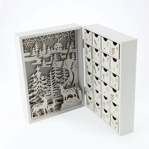 White wooden Christmas advent calendar book with LED deer scene and 24 storage drawers