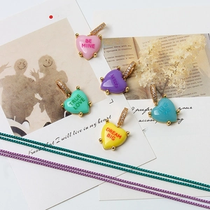Colorful heart enamel necklaces with golden edges and zircon-inlaid clasps on vintage cards