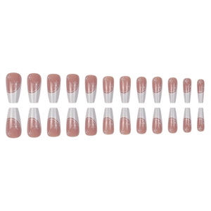 Christmas press-on nails set featuring long coffin shape with white snowflake patterns