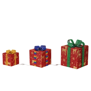 Three-piece red Christmas gift box set with gold reindeer patterns and ribbon bows