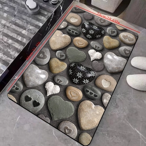 Detail view of 80x50cm diatom mud bath mat with 3D heart-shaped pebble pattern and dimensions