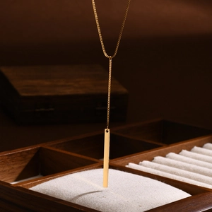Minimalist gold stainless steel Y necklace with a vertical bar pendant for women