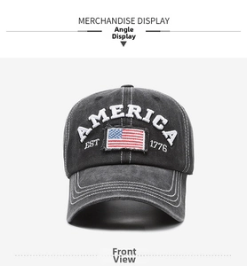 Detail of vintage gray washed baseball cap with America flag patch and white embroidery