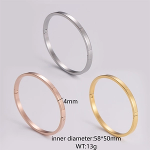 Detail of 4mm polished oval hinged bracelets in silver, gold, and rose gold finishes