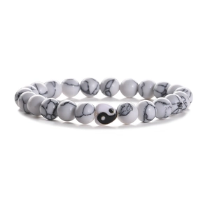 White marble bead bracelet with Yin Yang charm for couples on a white background