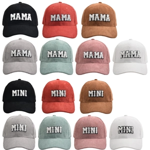 Matrix view showing corduroy MAMA and MINI baseball caps in various colors