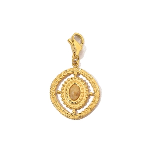 Close-up of gold stainless steel pendant with amber stone and lobster clasp detail