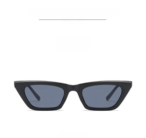 Front view detail of minimalist black cat-eye sunglasses with gray lenses and sleek frame