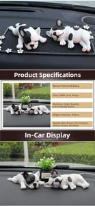 Macro detail of realistic sleeping French Bulldog resin figurines for car dashboard decor