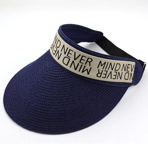 Close-up of navy woven sun visor with MIND NEVER lettered band and adjustable strap