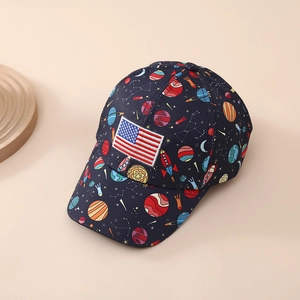 Detailed close-up of dark blue kids' baseball cap with galaxy prints and US flag patch