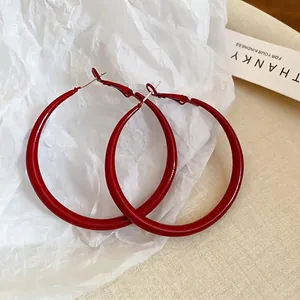 Glossy red enamel hoop earrings for women with large 5cm circular geometric design