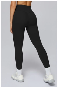 Detail of high-waisted yoga leggings with V-shaped back stitching for butt lifting