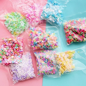 Colorful 10g polymer clay slices in various fruit and star shapes for DIY nail art crafts