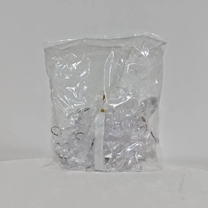 Detailed set of clear acrylic Christmas snowflake ornaments with rings and white ribbon