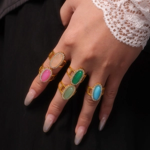 Five-piece set of gold-plated rings with colorful stones and sparkling zircon accents