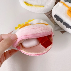 Cute plush fried egg coin purse for girls with a pink zipper and soft interior storage