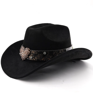 Detail of black cowboy hat with heart metal buckle and rhinestones on a paisley band