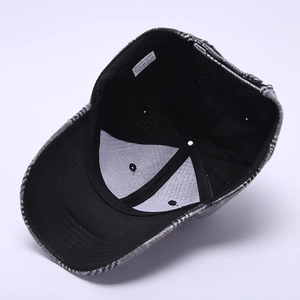 Detailed interior of grey plaid baseball cap showing 100% polyester lining and label