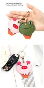 Détails de porte-clés en cuir animalier glace avec coutures fines et anneau doré
