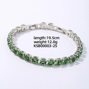 Detailed shot of silver hip hop bracelet with green zircons and specifications