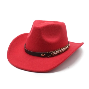 Macro view of red wool fedora with woven leather band and decorative metal buckle